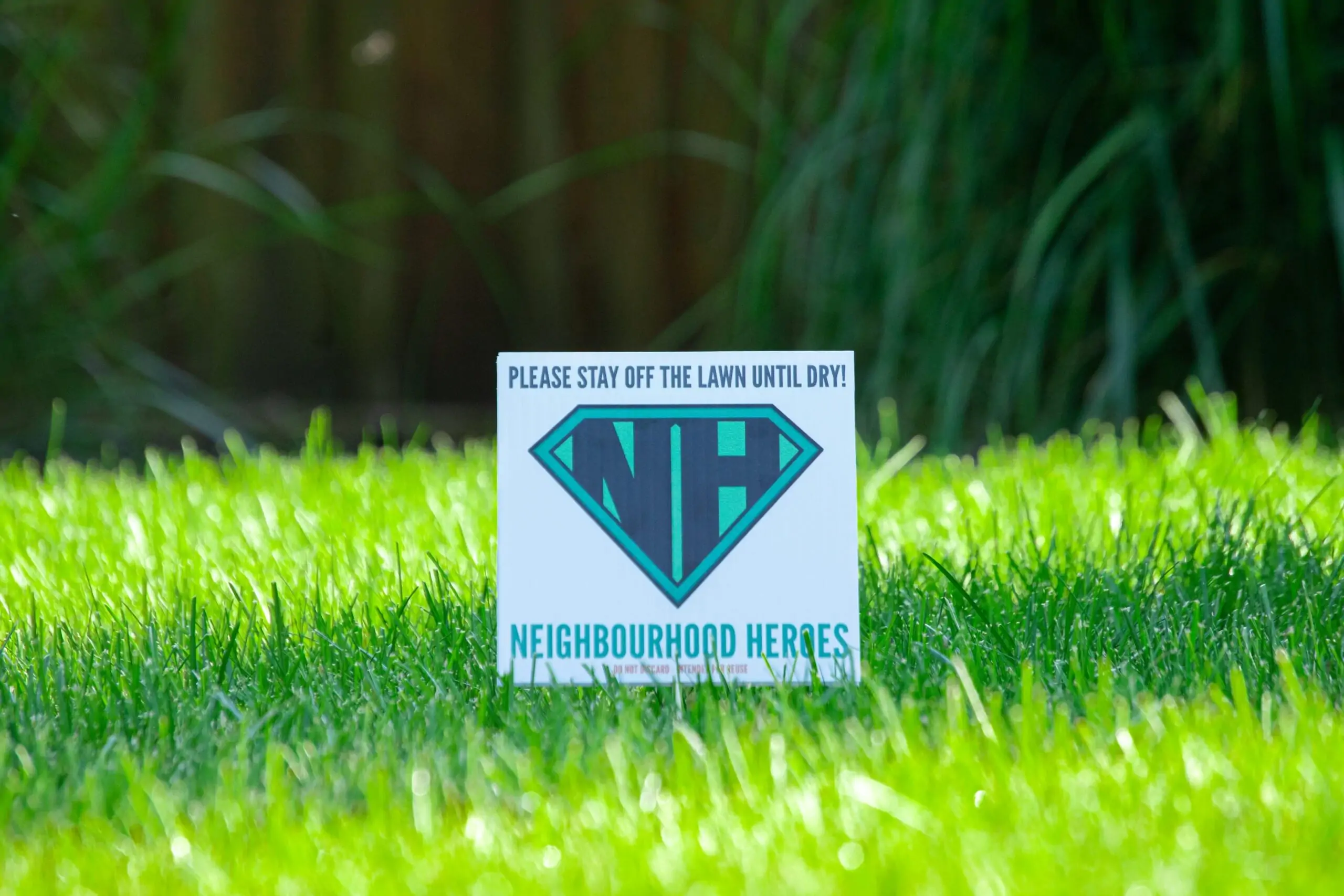 neighbourhood heroes Sign on perfect green lawn